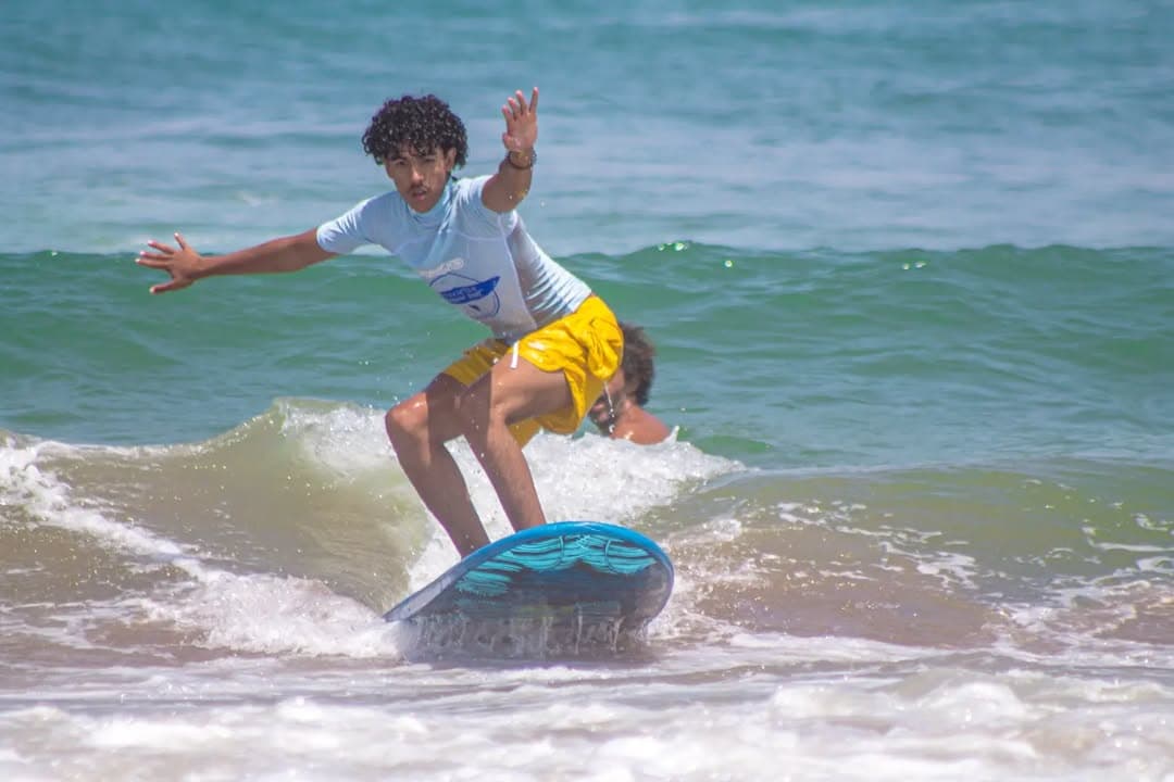 Surfer catching a wave