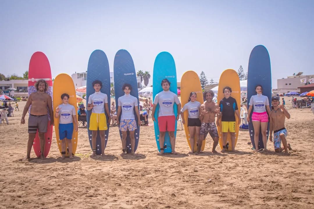 Surf instructor leading warmup exercises